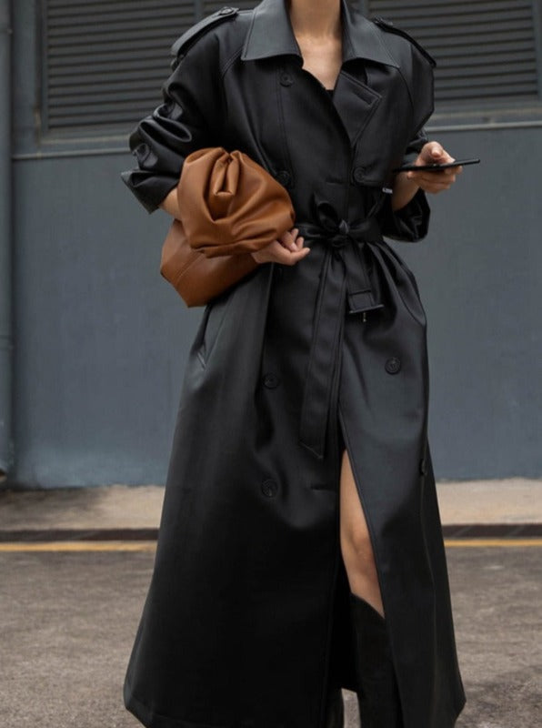 Commanding Presence: A Longline Faux Leather Trench Coat For Women