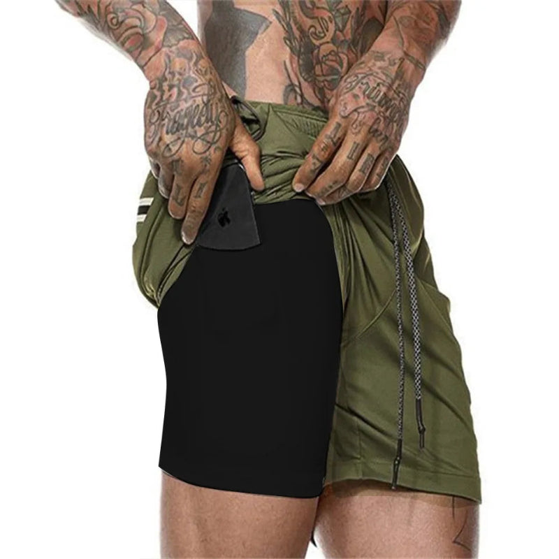 Person wearing a green athletic skirt over black shorts on a white background