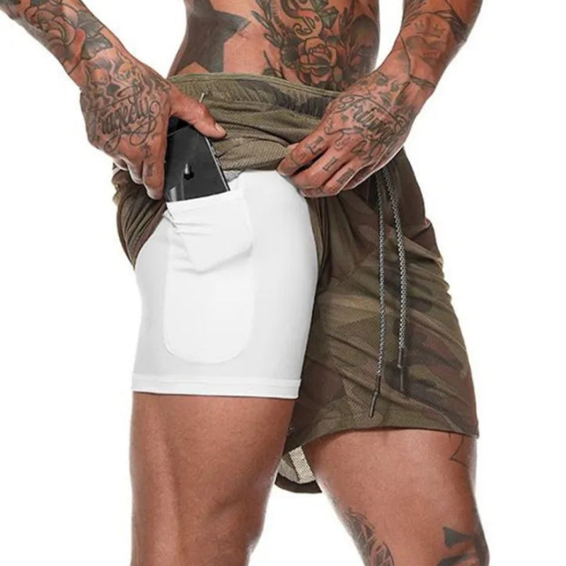 Person wearing a green shirt over white shorts on a white background