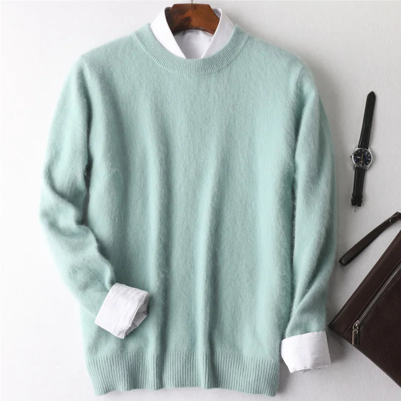 Light green sweater with white cuffs and collar on a wooden hanger against a white background.