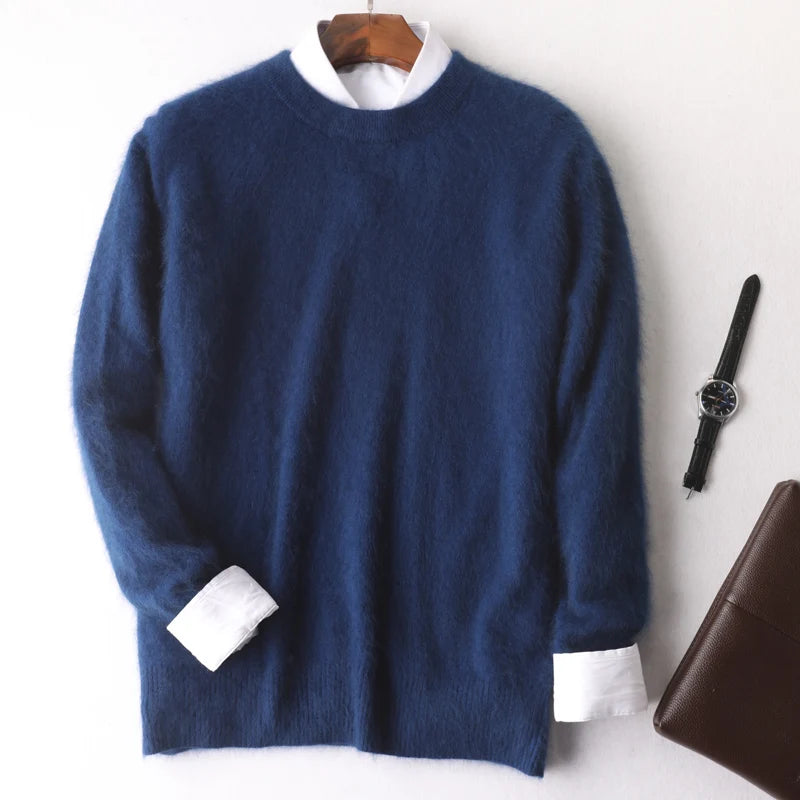 Blue sweater with white cuffs and collar on a hanger, next to a watch and brown leather clutch.
