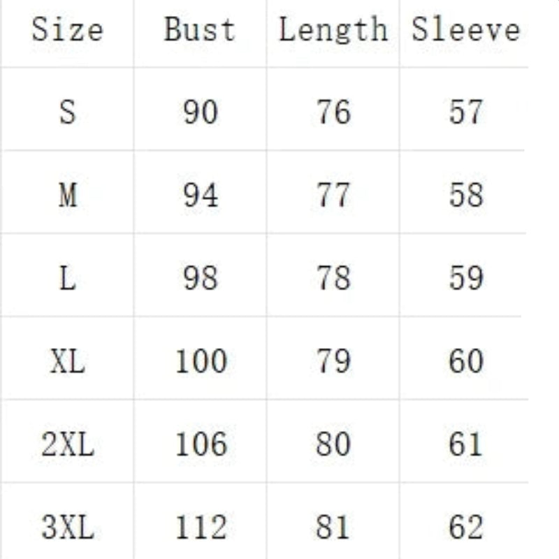 Woman wearing a beige cardigan with a size chart on the left