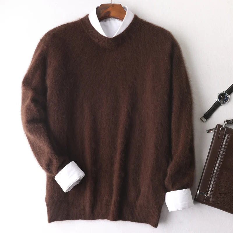 Brown sweater with white cuffs on a hanger against a white background