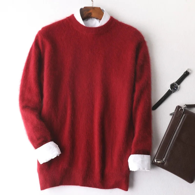 Red sweater with white cuffs and collar on a hanger, next to a watch and brown bag on a white background