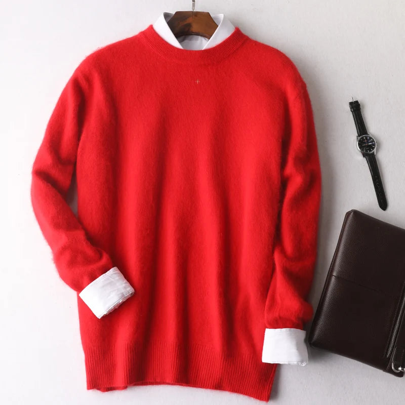 Red sweater with white cuffs on a hanger, next to a brown leather bag and black watch on a light gray background