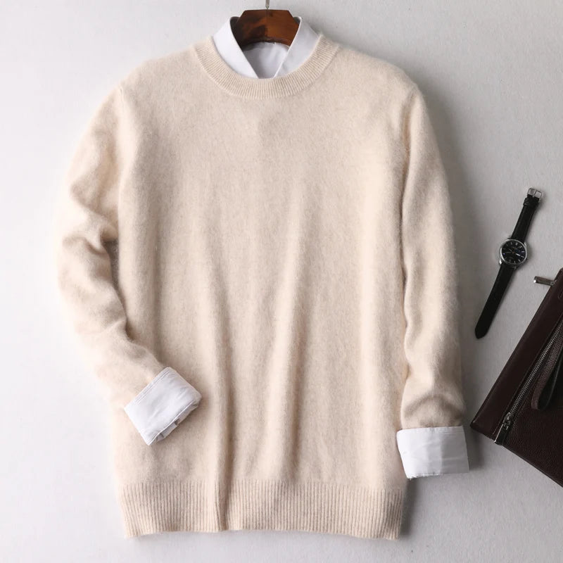 Beige sweater with white shirt collar on a gray background