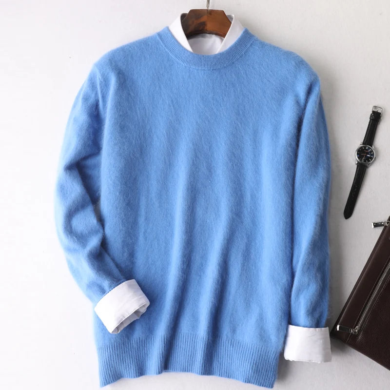 Blue sweater with white cuffs and collar on a hanger against a white background