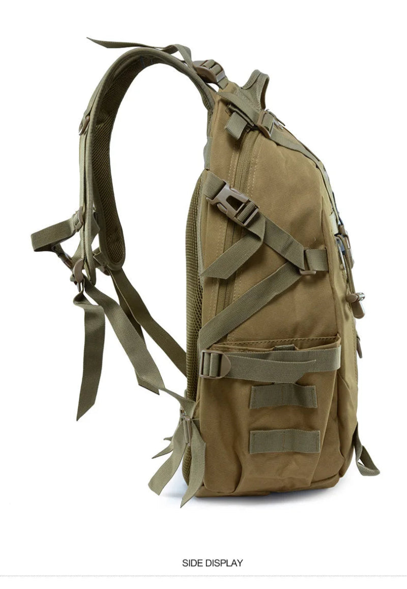 Tan military-style backpack with multiple straps and pockets on a white background