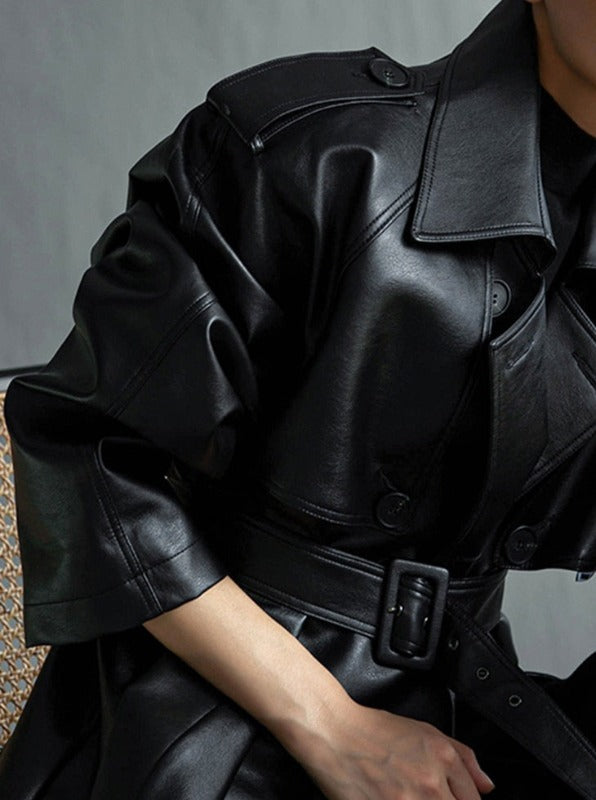 Commanding Presence: A Longline Faux Leather Trench Coat For Women