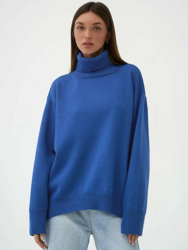 Woman wearing a blue sweater and light blue jeans on a white background with 'Bornladies' branding.