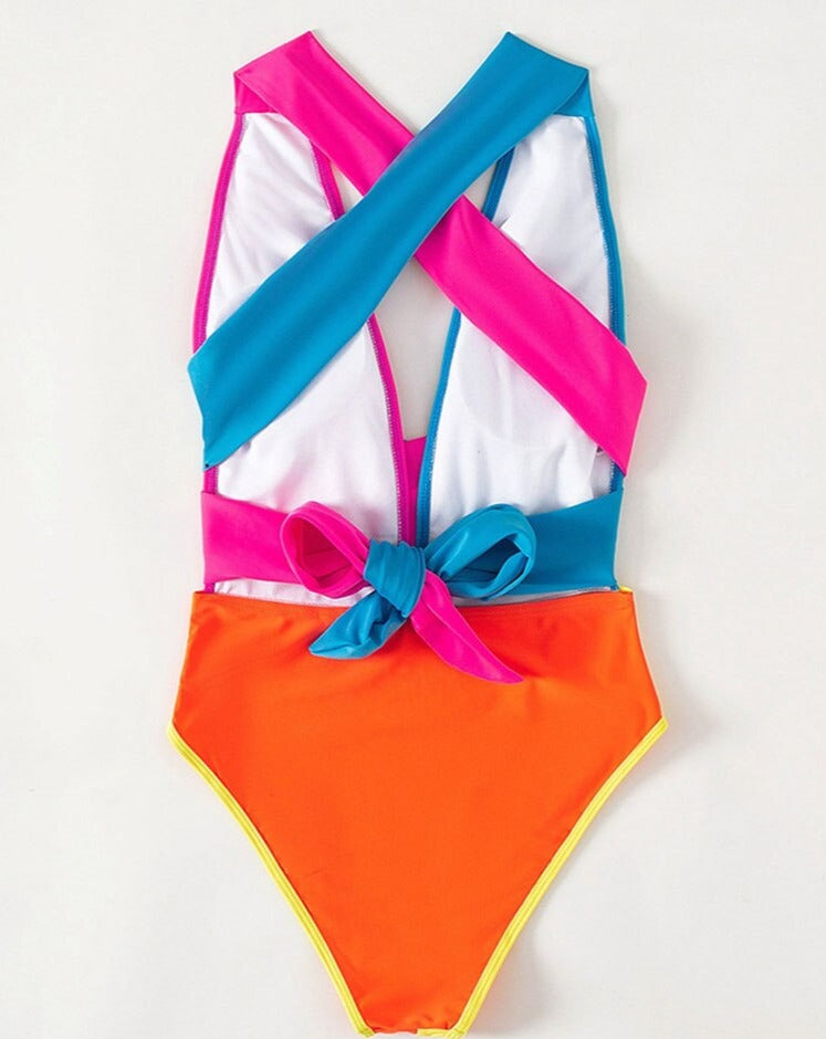 Beach Bonanza: Stand Out In A Patchwork One-Piece Swimsuit