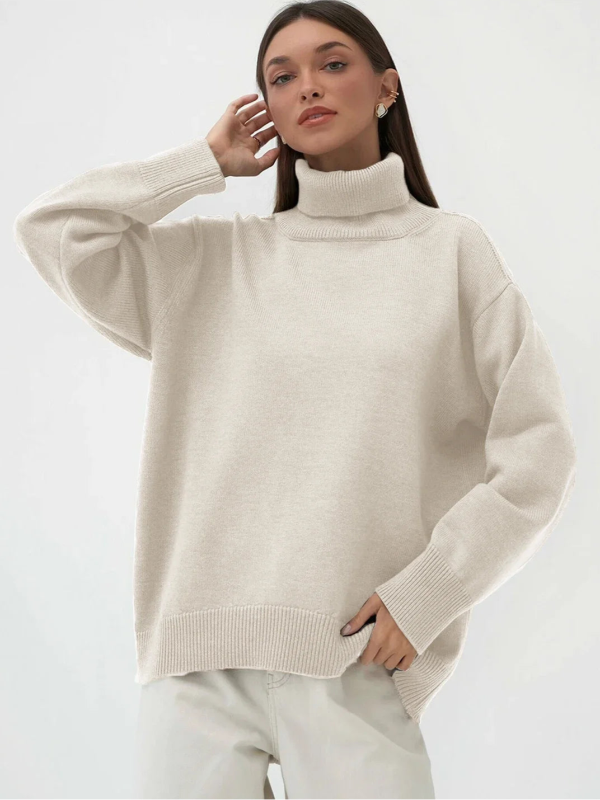 Woman wearing a beige turtleneck sweater on a white background with 'Bornladies' branding.