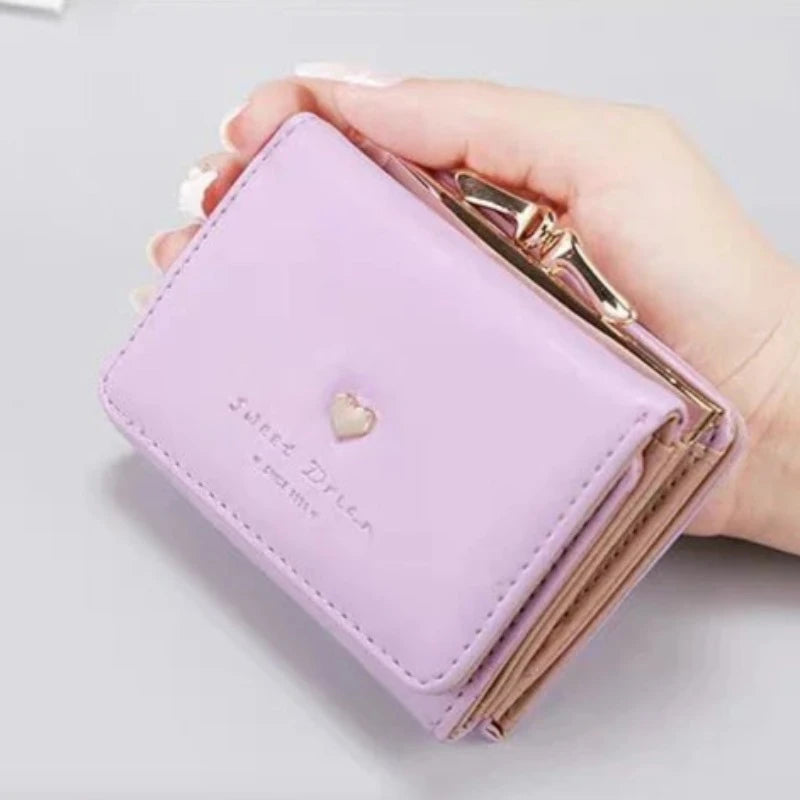 Mini Marvel: Compact Leather Coin Purse With Heart Charm