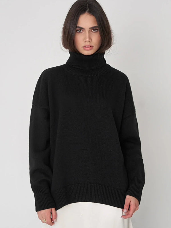 Woman wearing a black turtleneck sweater on a plain background with 'Bornladies' branding.