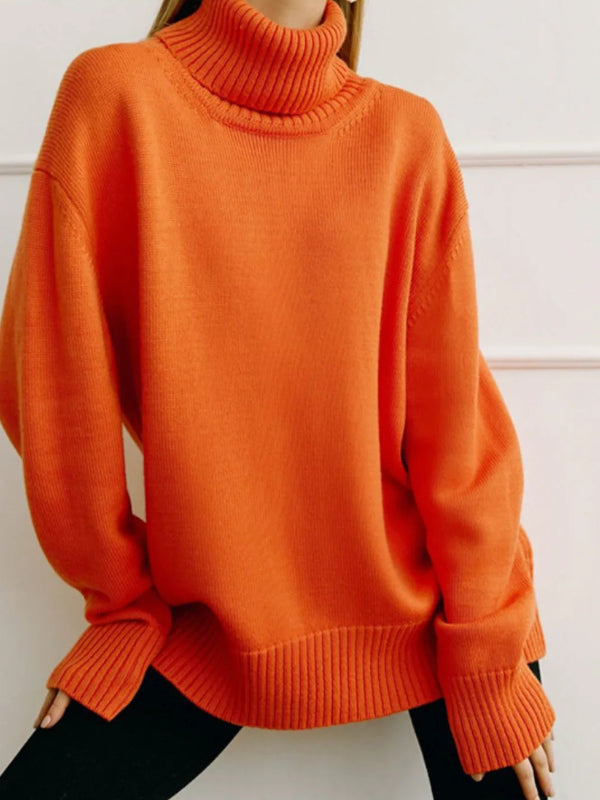 Orange turtleneck sweater worn by a person against a white background