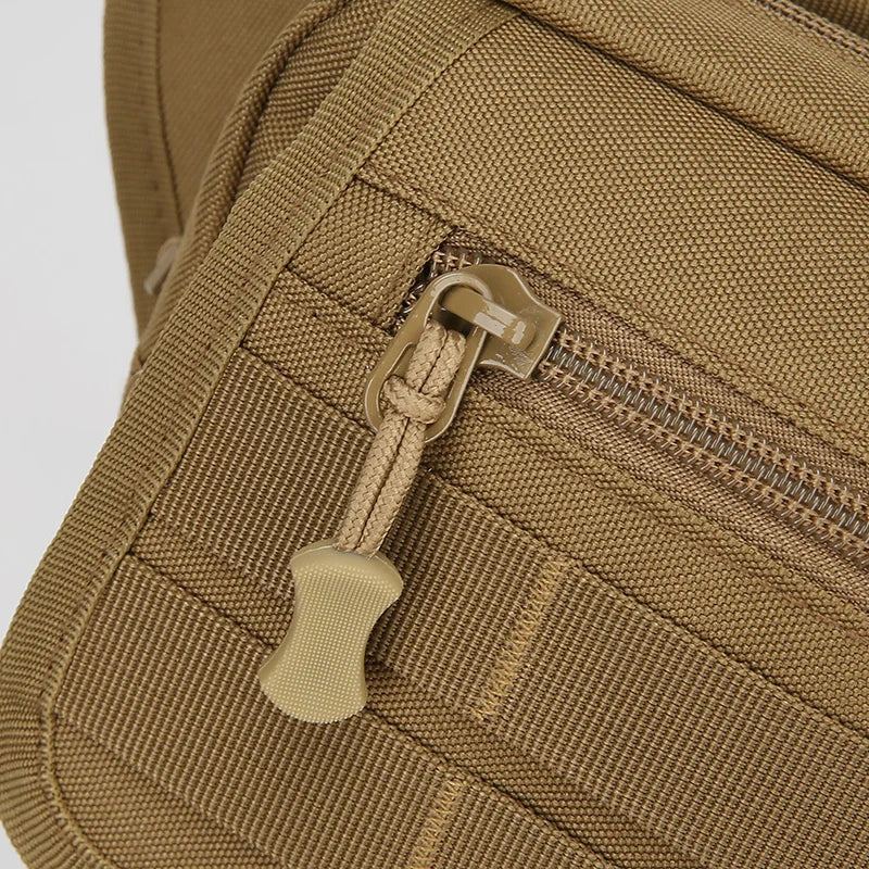 Close-up of a brown tactical bag with a zipper and strap.