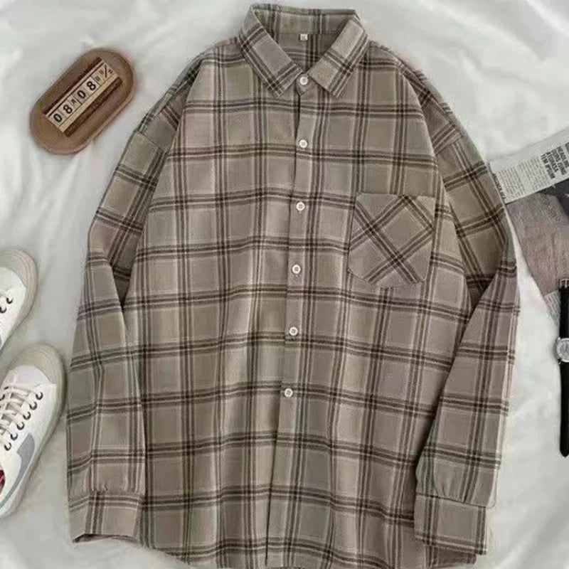 Women's Layering Staple: The Oversized Plaid Button-Up Shirt